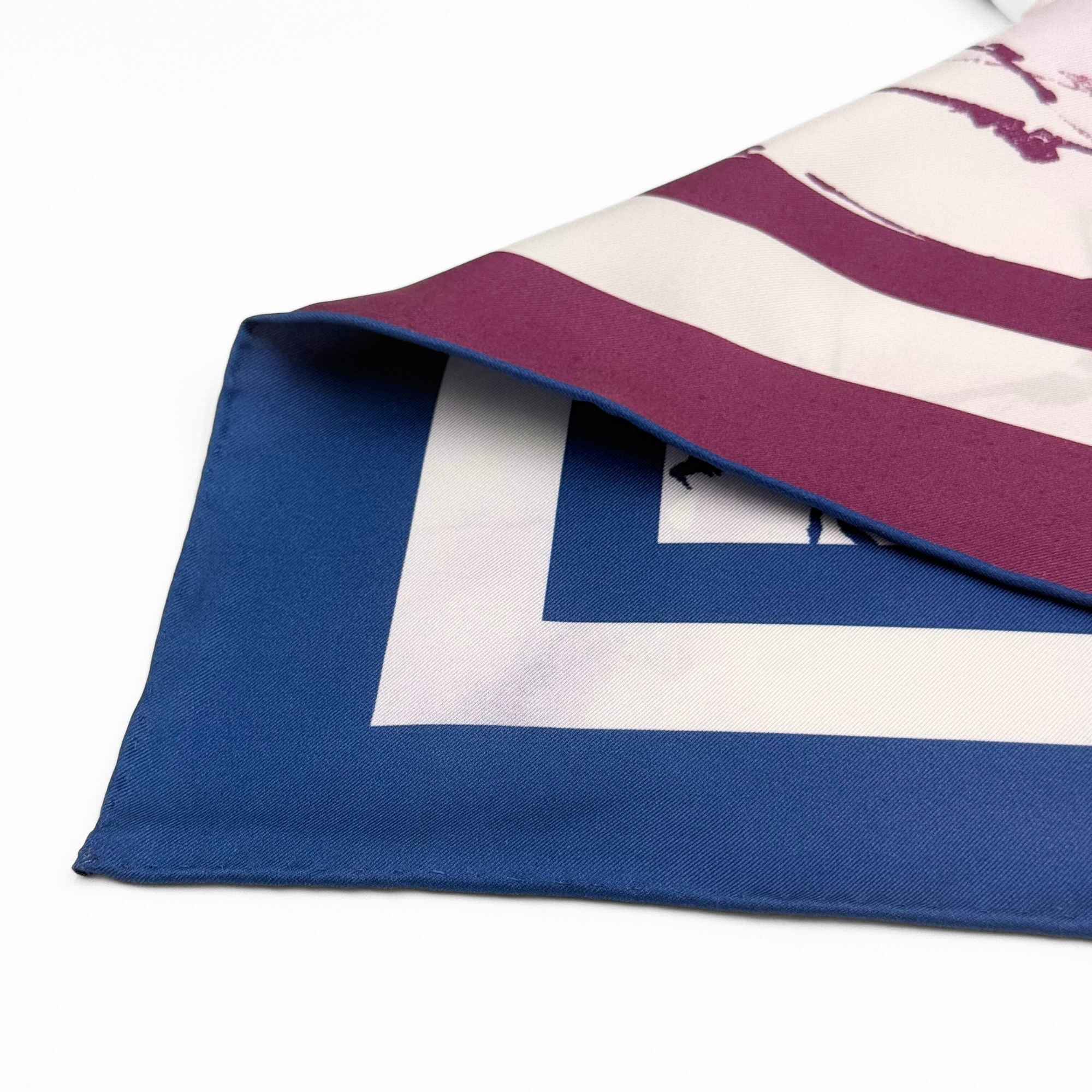 Close up of the hand rolled hem on the silk twill scarf 'Beautiful Botanicals'