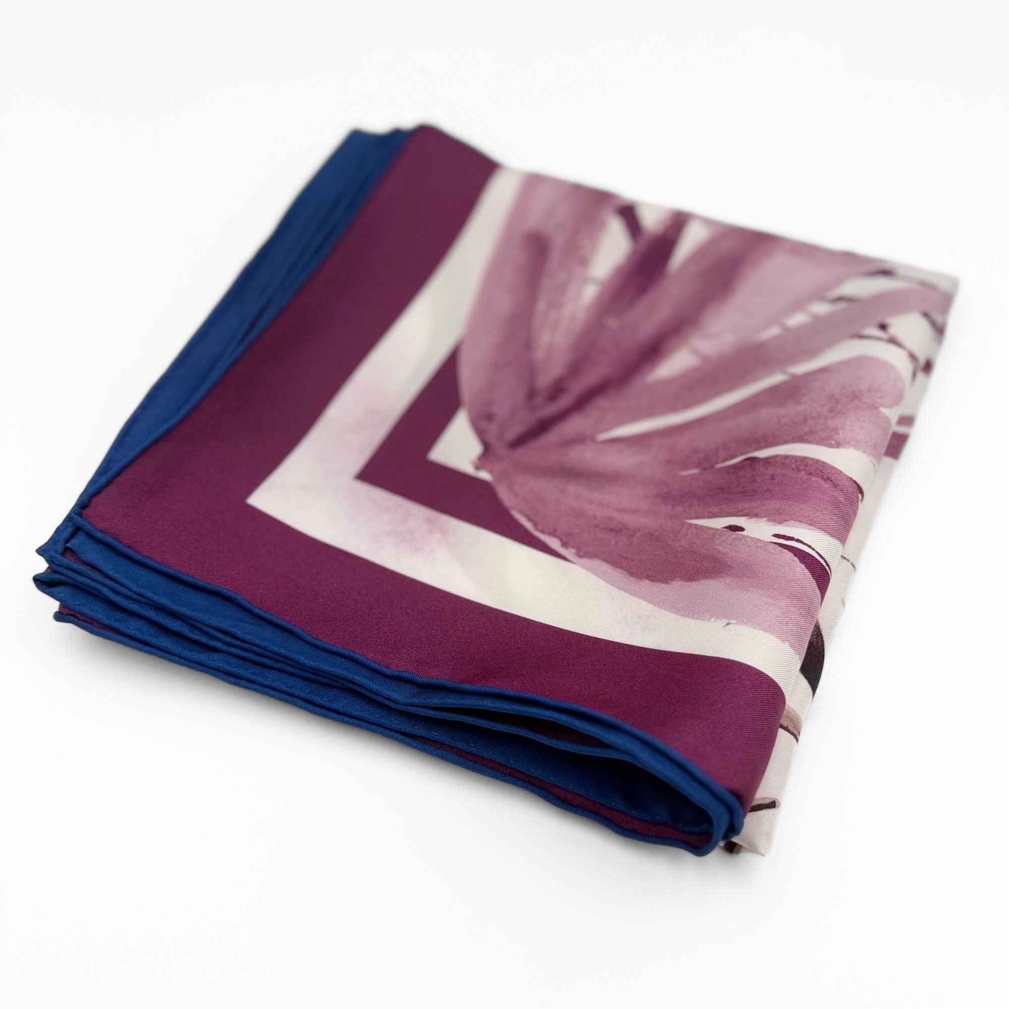 Folded 'Beautiful Botanicals' silk twill scarf on a white background