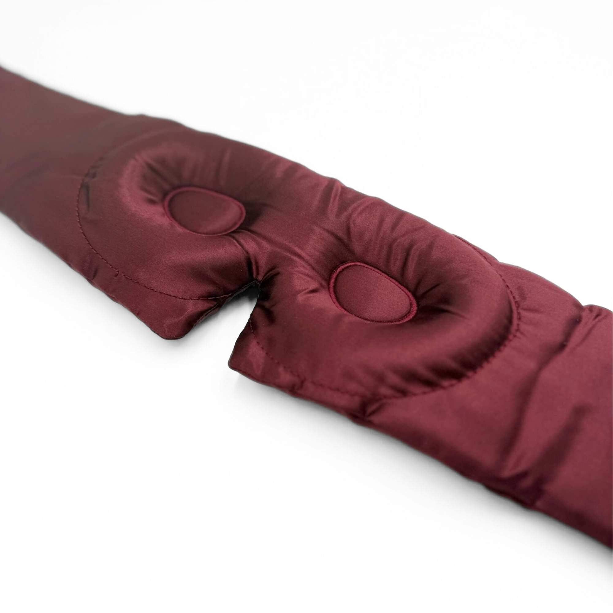 the 3d contoured eye part of the burgundy 3d silk sleep mask
