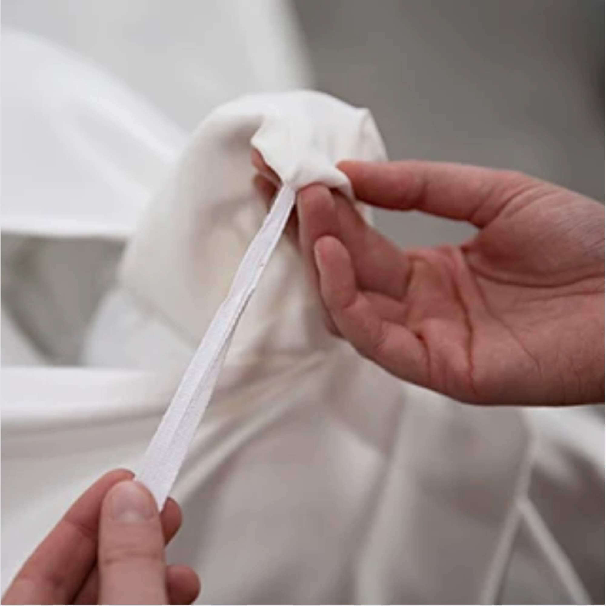 close up of ties inside a silk duvet cover