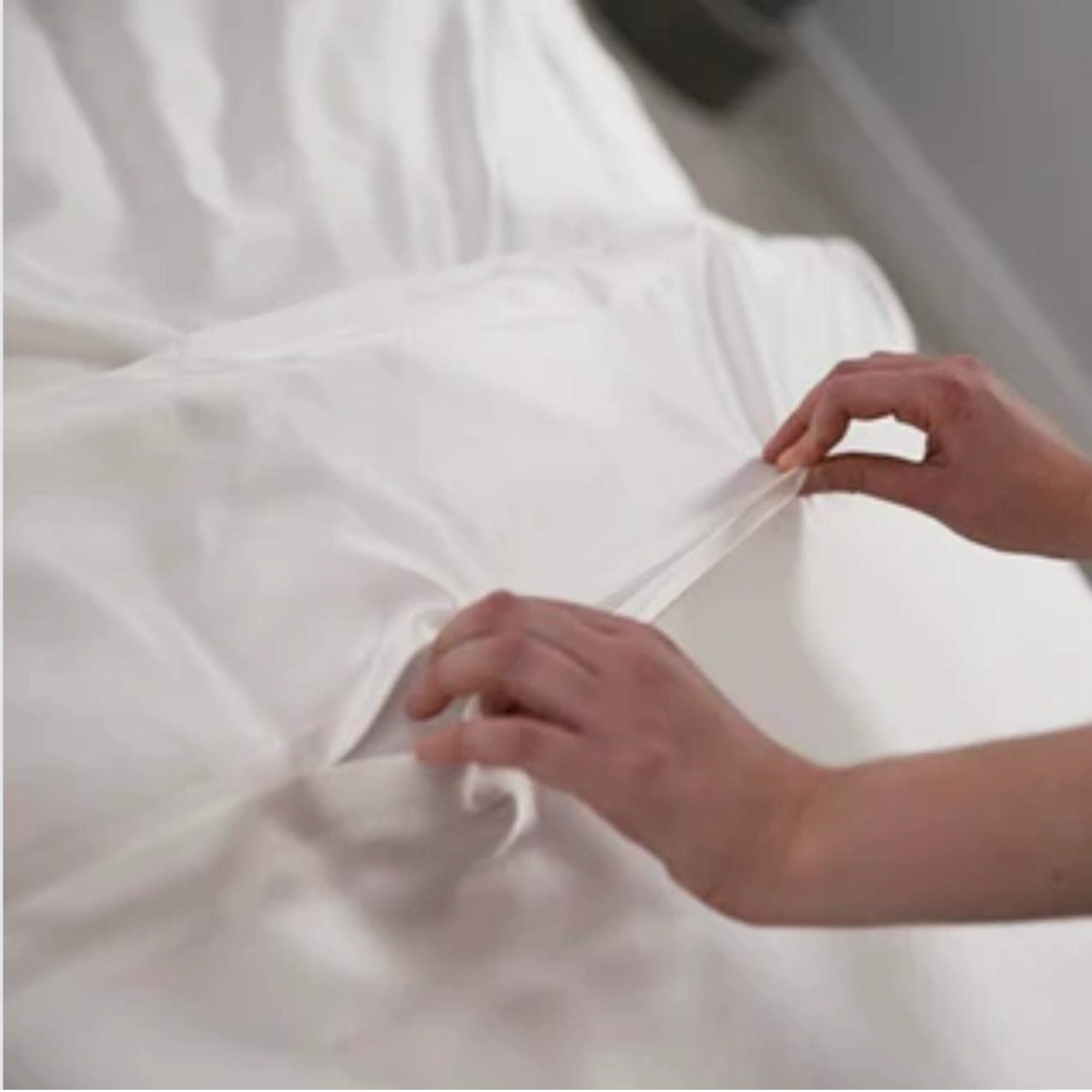 showing concealed zip of an ivory 25 momme silk duvet cover
