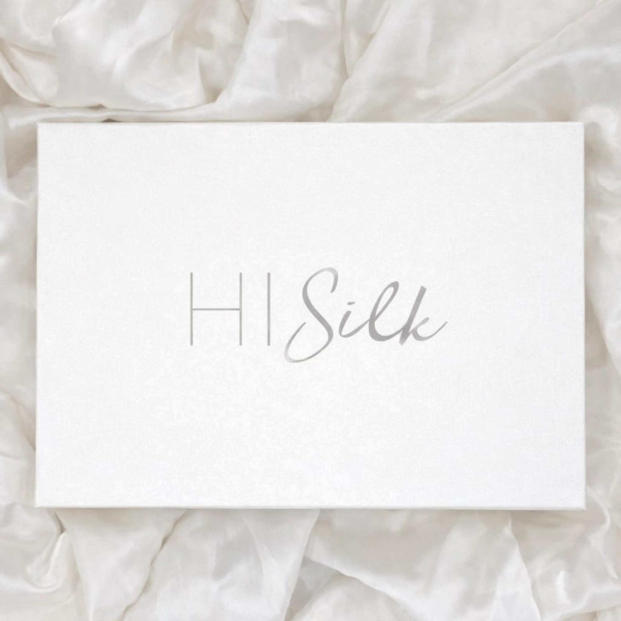 a white box with the word HI Silk written on it in silver text