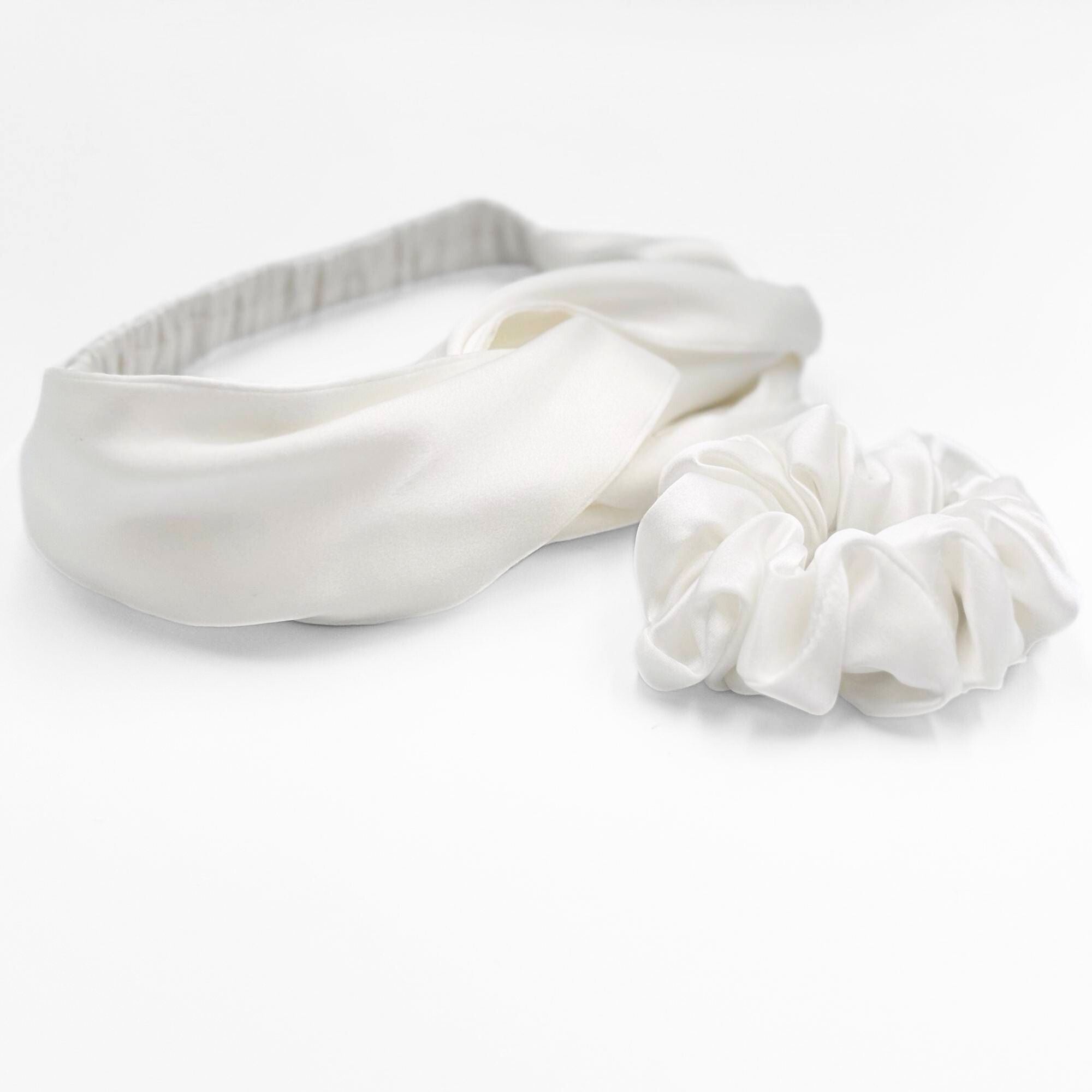 ivory White silk headband and scrunchie set on a light grey background