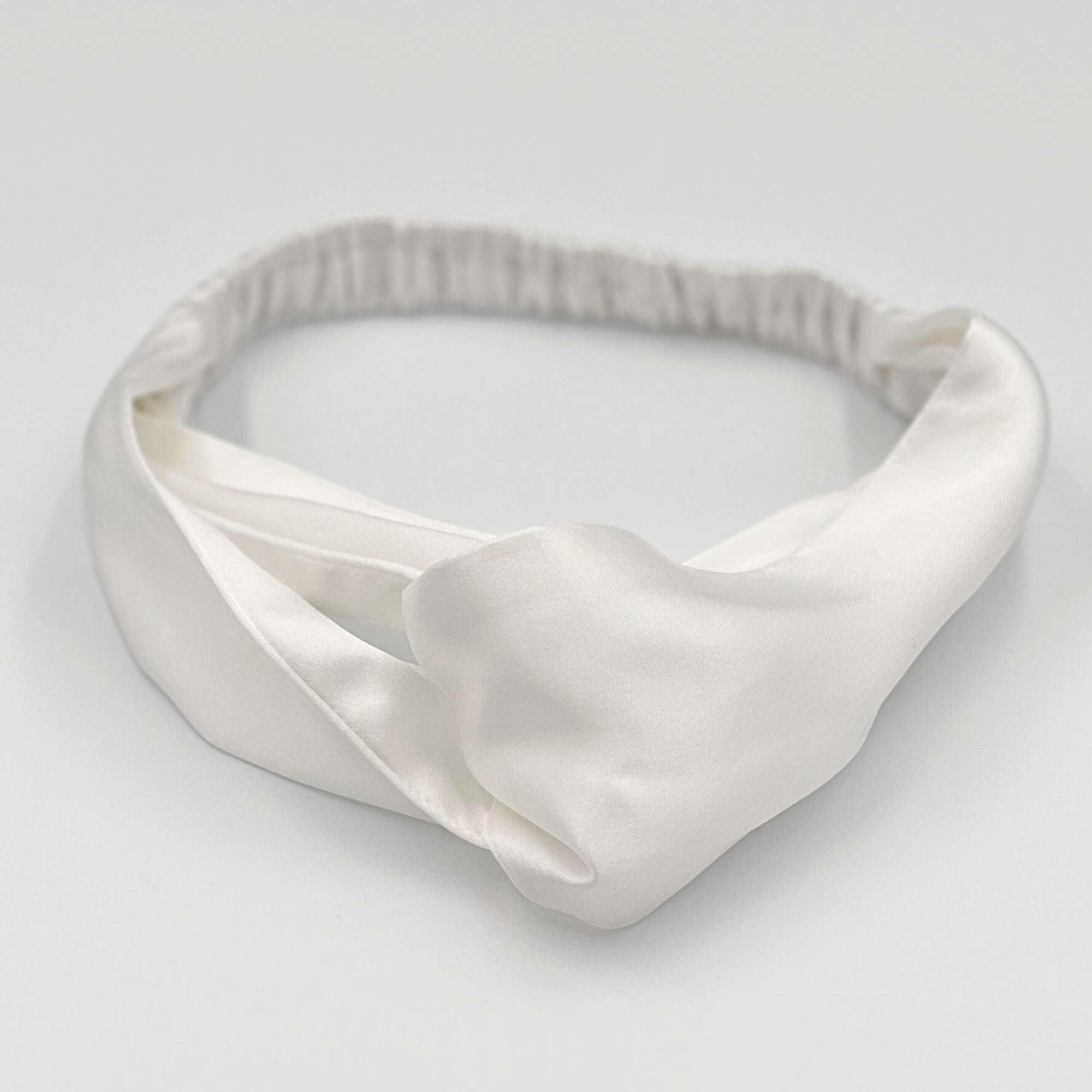 ivory white mulberry silk headband on a white background