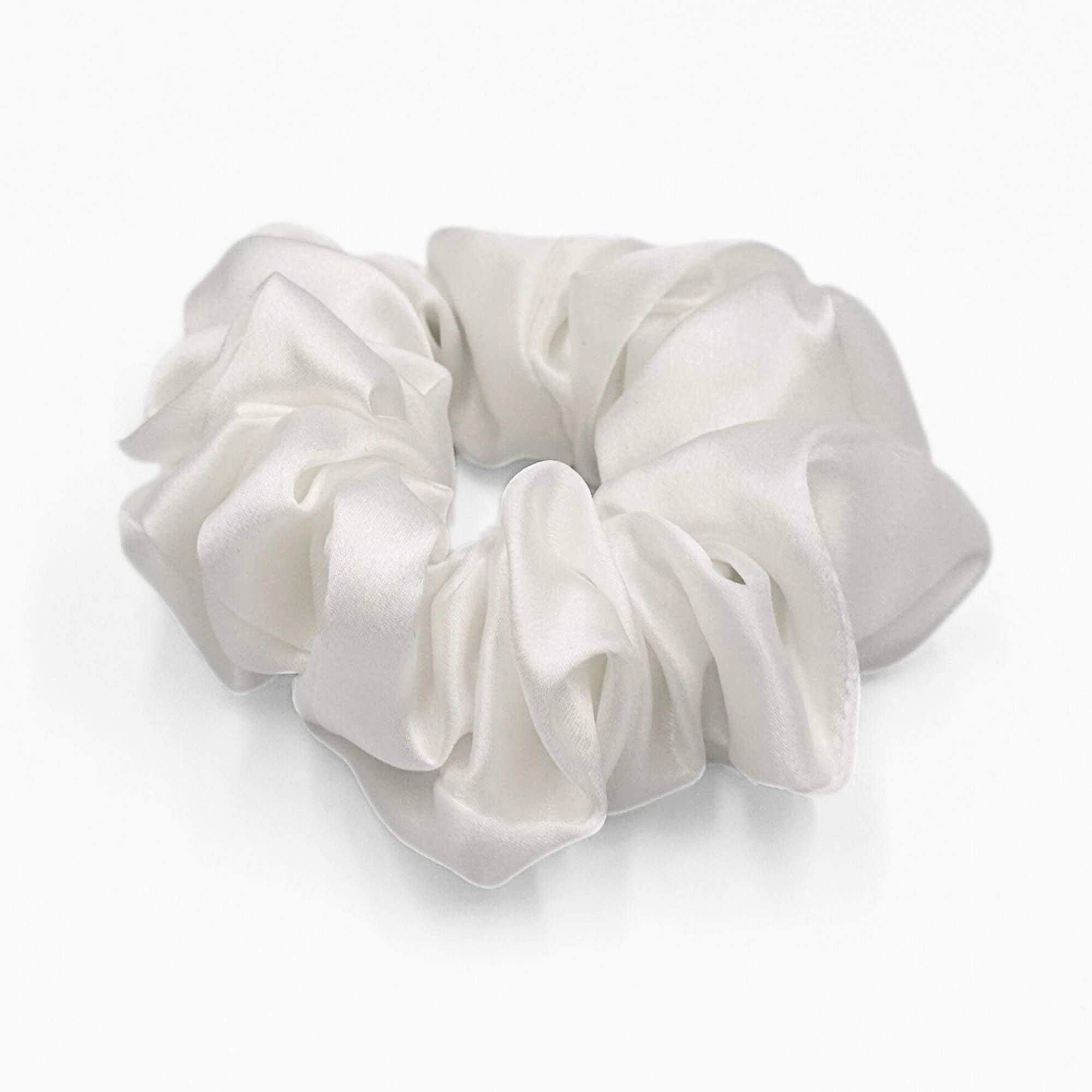 ivory White mulberry silk scrunchie on a light grey background