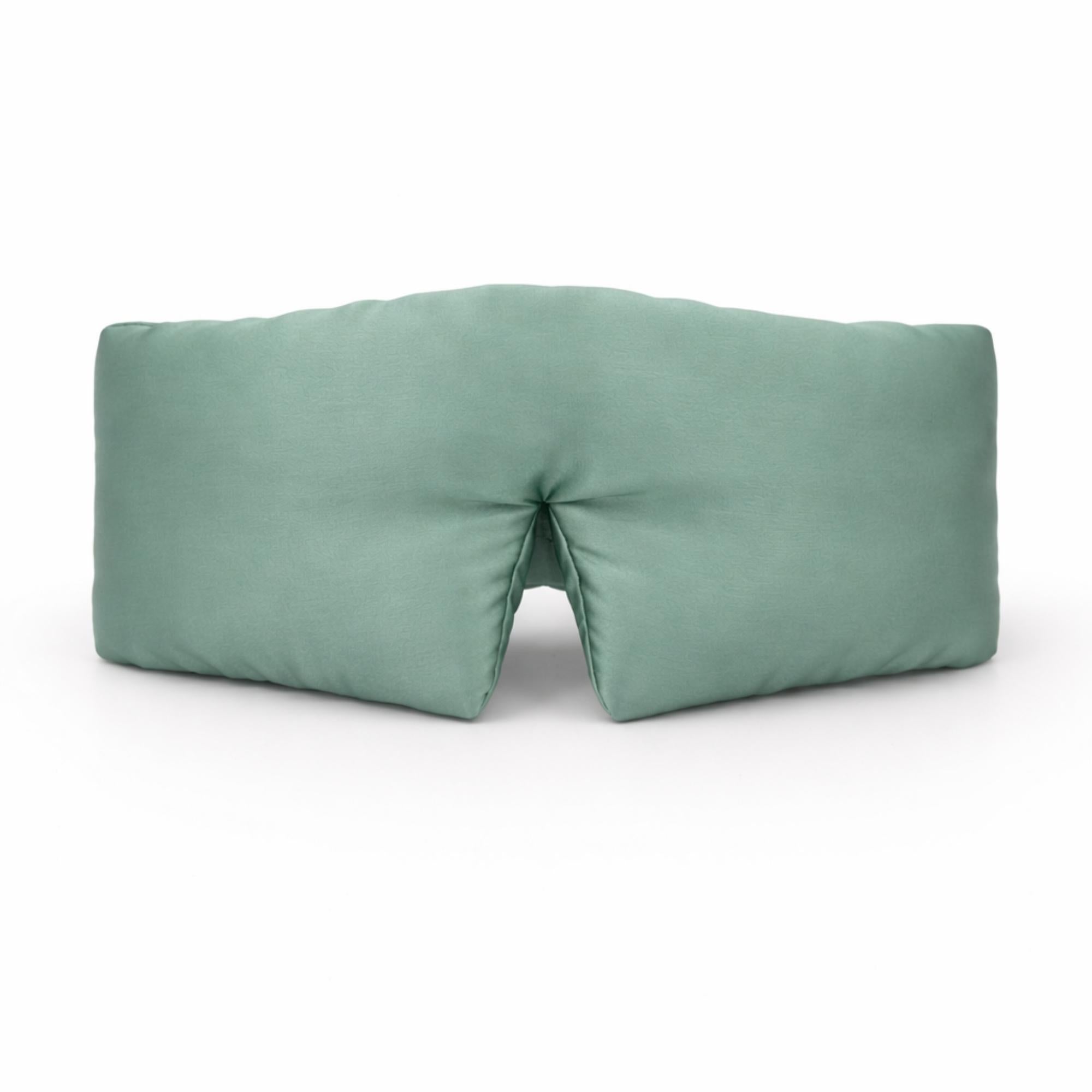 ocean green silk eye mask on a white background