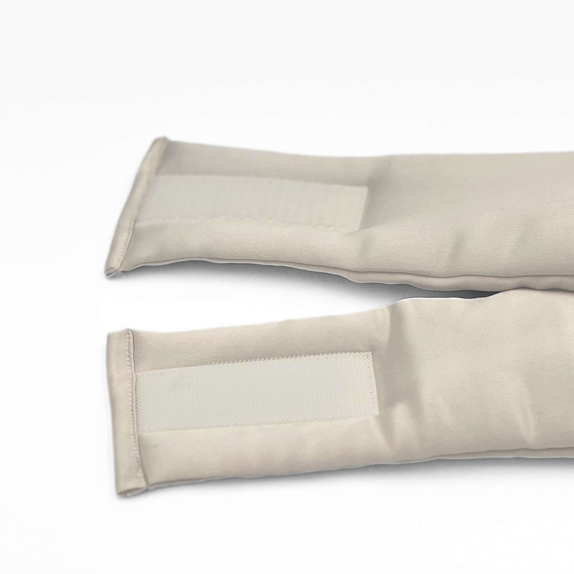 the adjustable strap of the pebble beige mulberry silk sleep mask