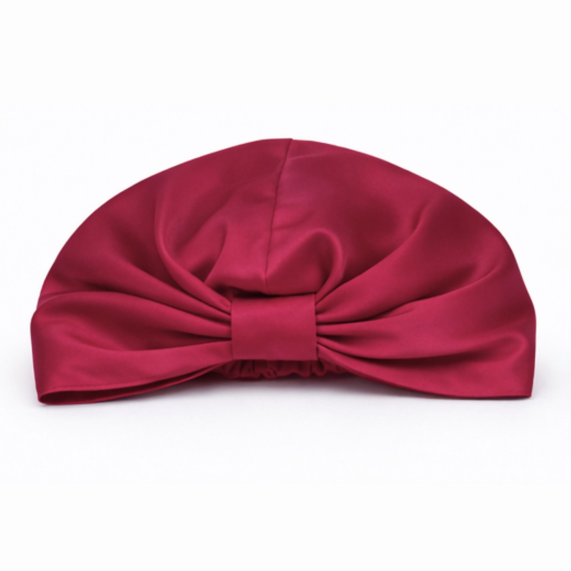 red silk bonnet on a white background