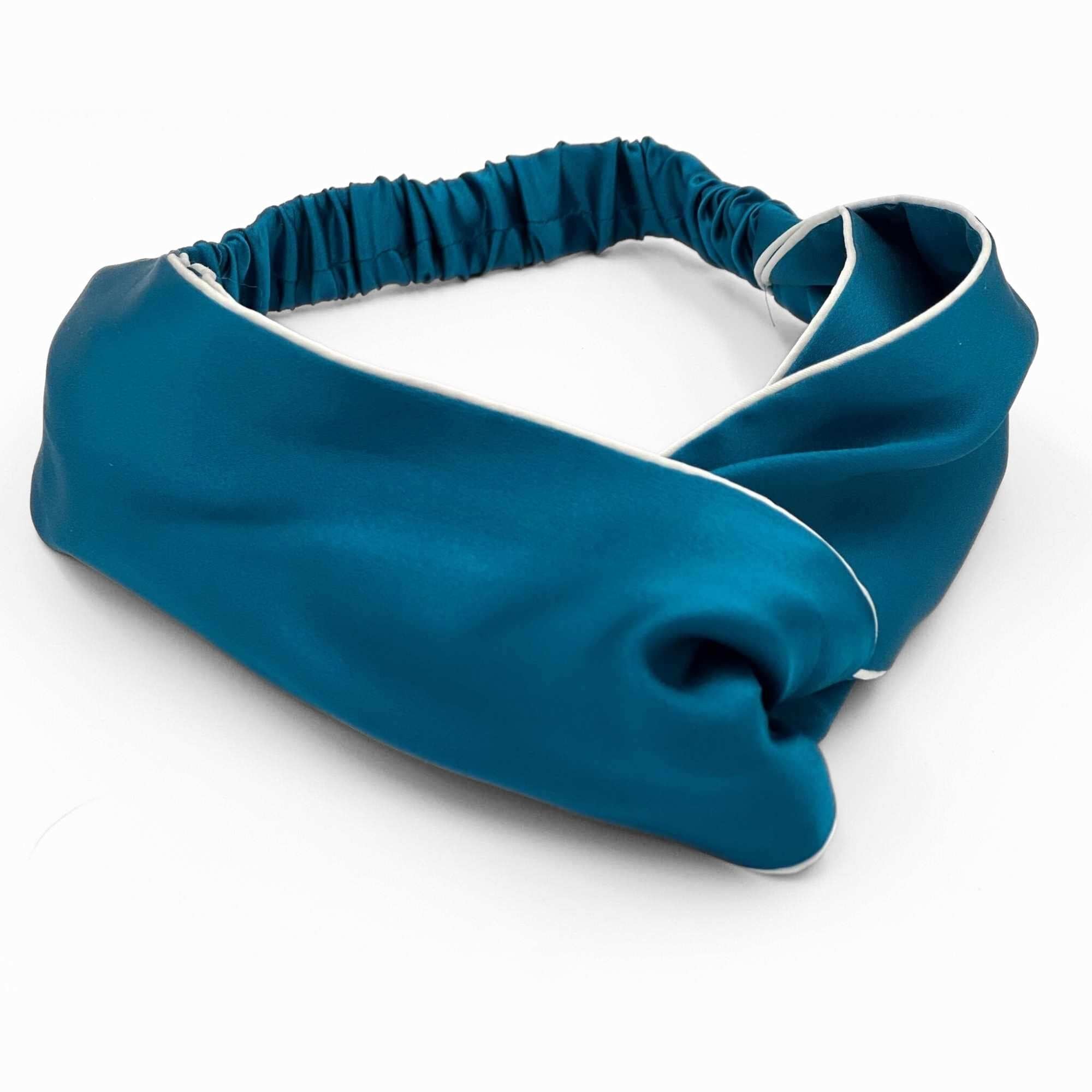 teal blue mulberry silk headband on a white background