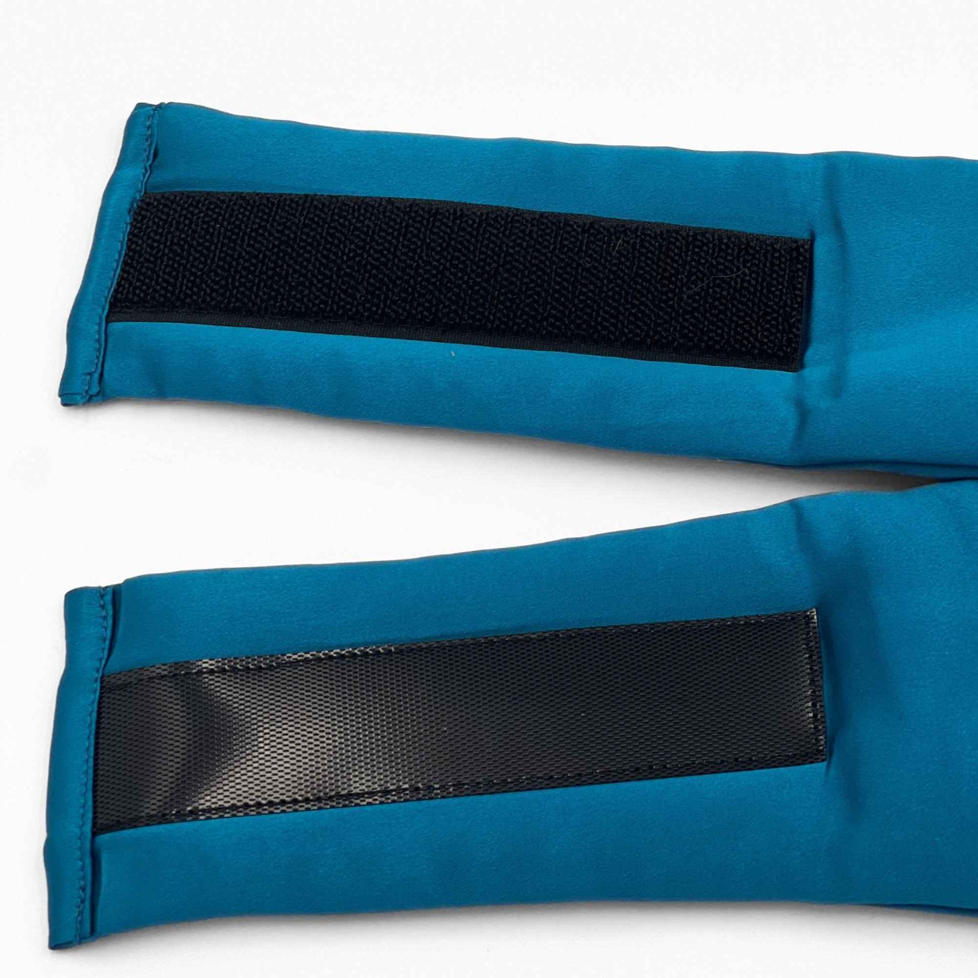 the adjustable strap of the teal blue padded mulberry silk eye mask