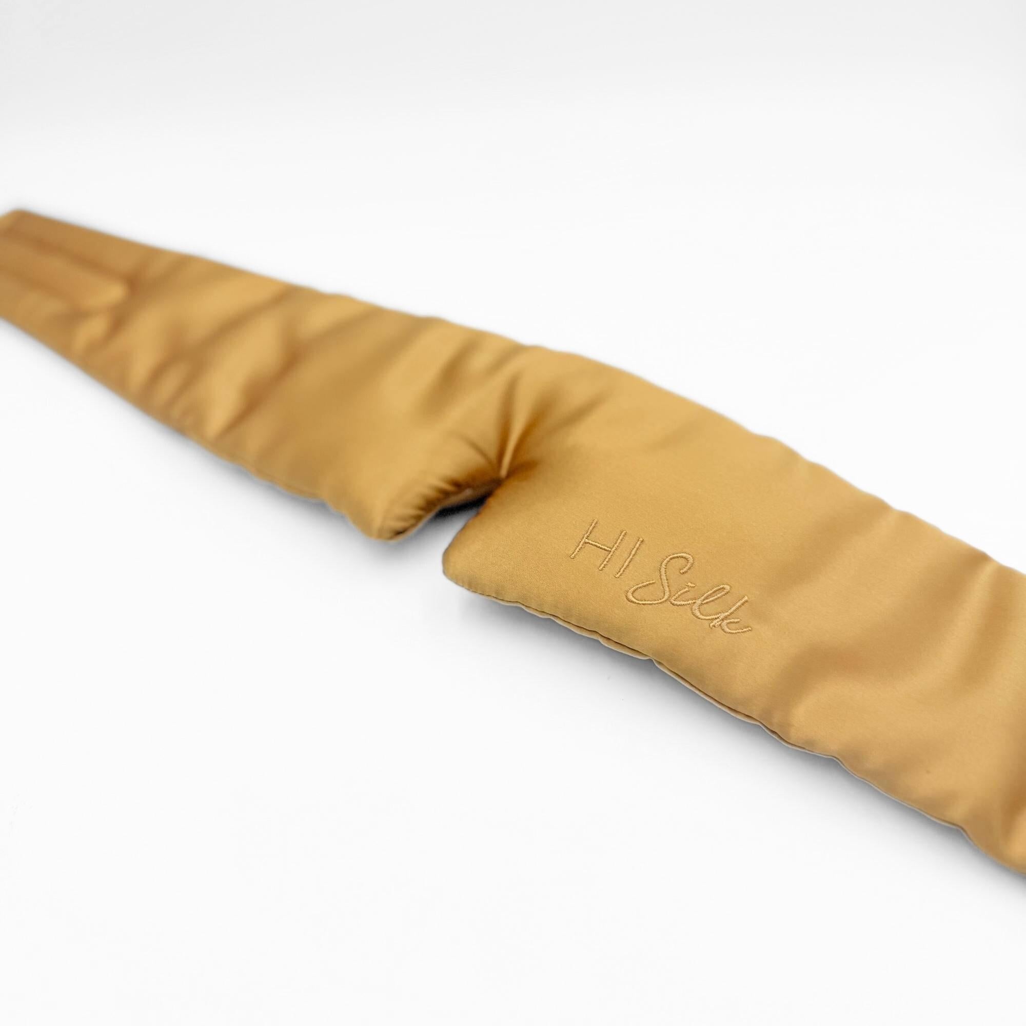 Honeycomb coloured 3d silk eye mask lying flat on a white background