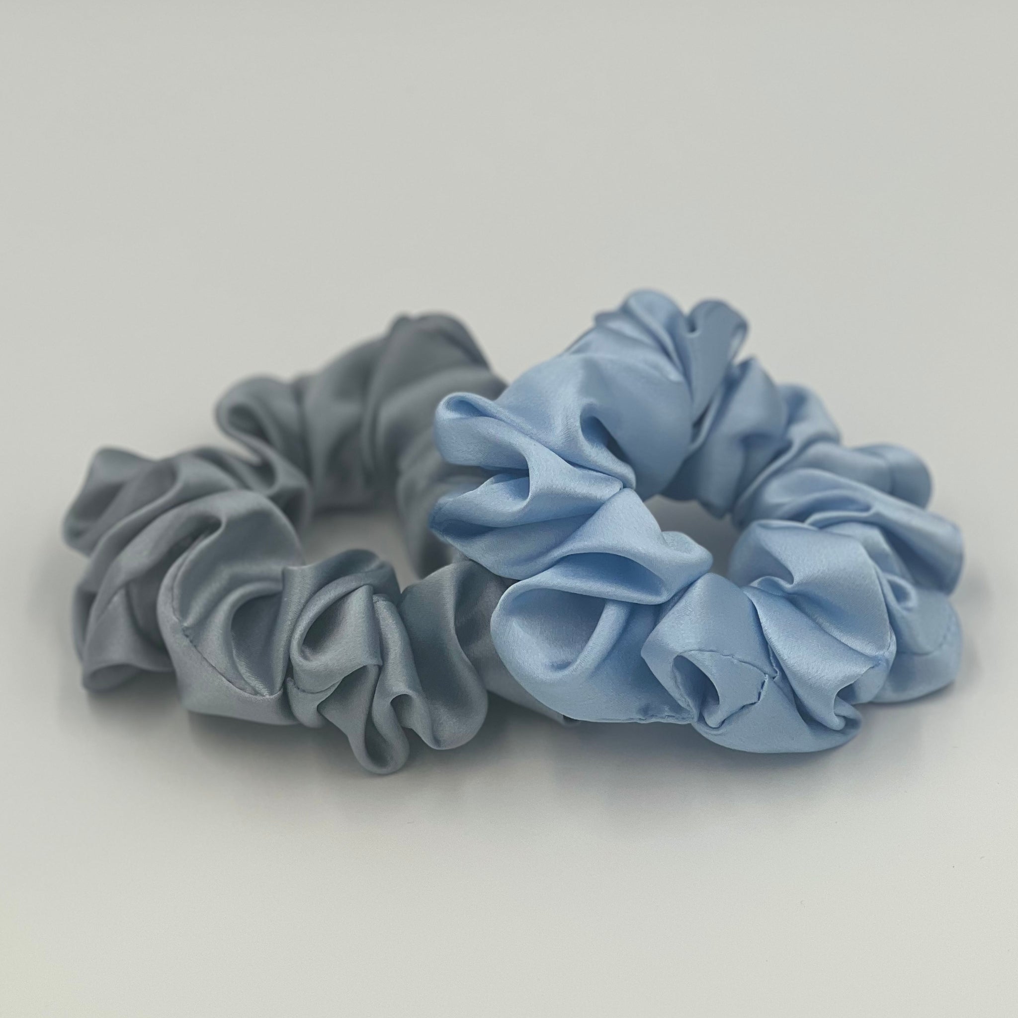 dusty blue and baby blue silk scrunchies