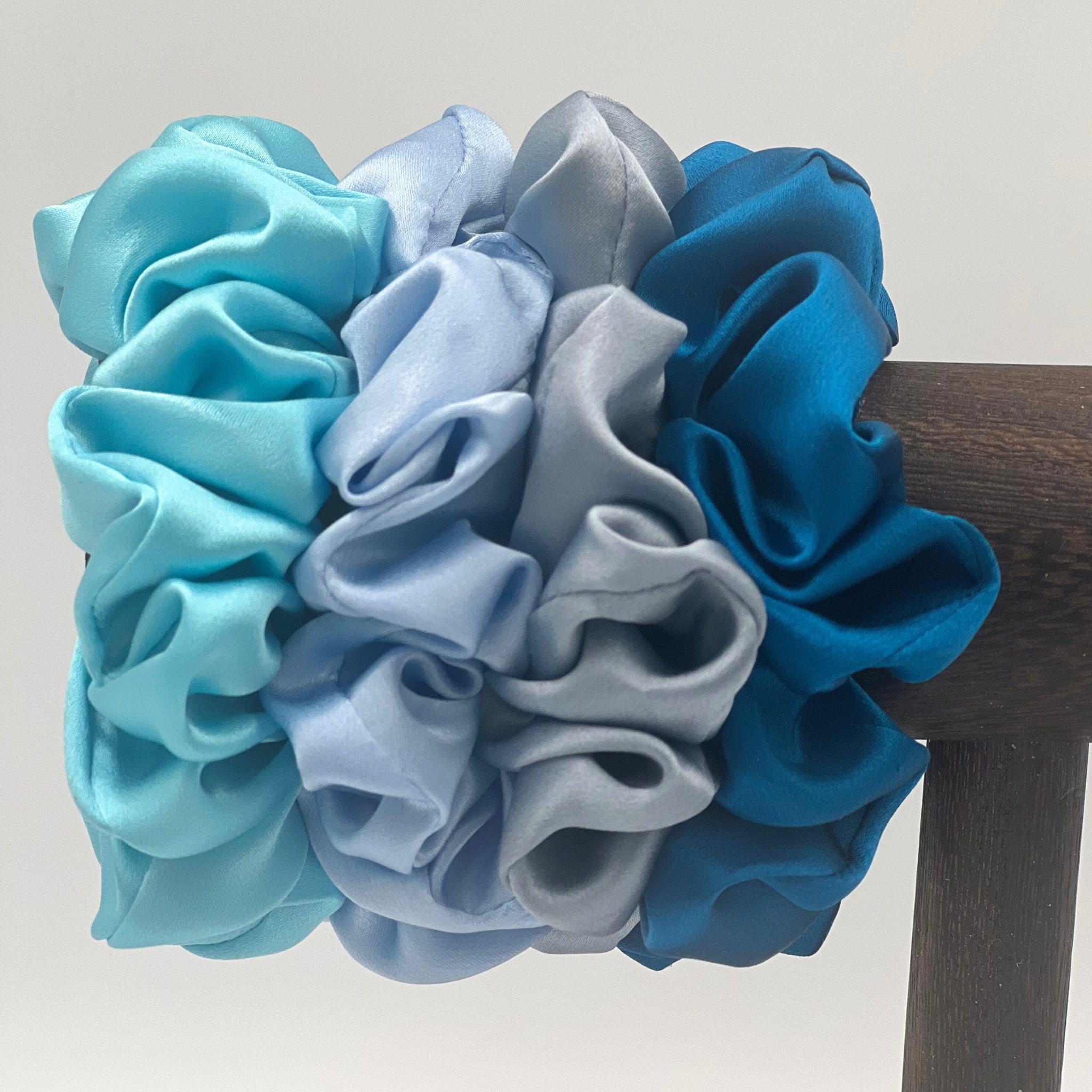 robins egg blue, baby blue, dusty blue and crystal teal silk scrunchies