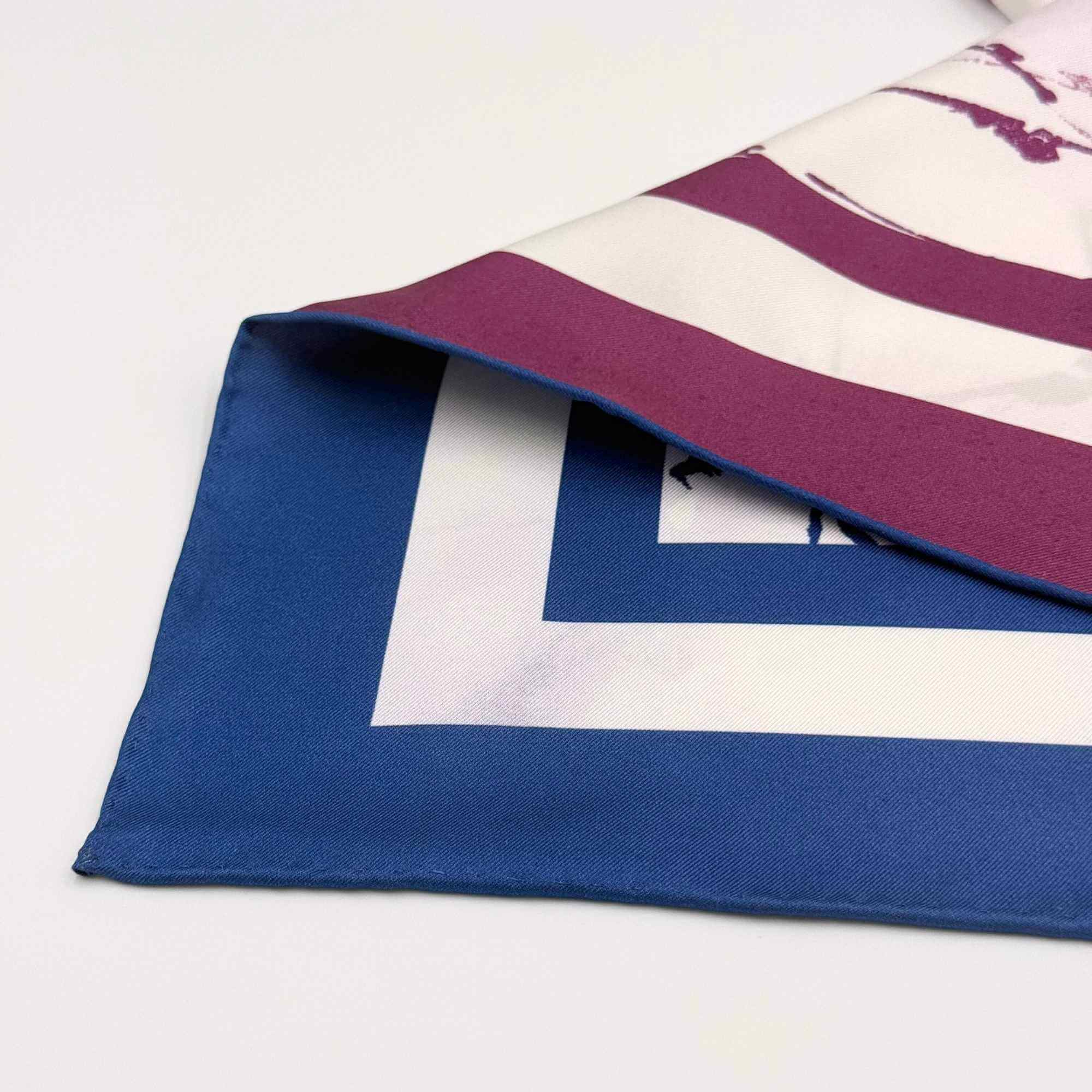 Close up of the hand rolled hem on the silk twill scarf 'Beautiful Botanicals'