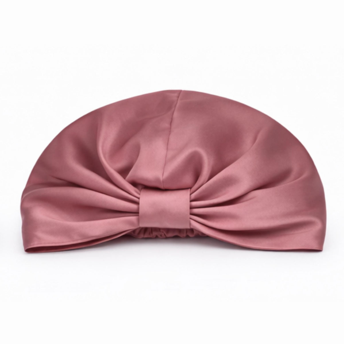 dusty pink mulberry silk bonnet on a white background