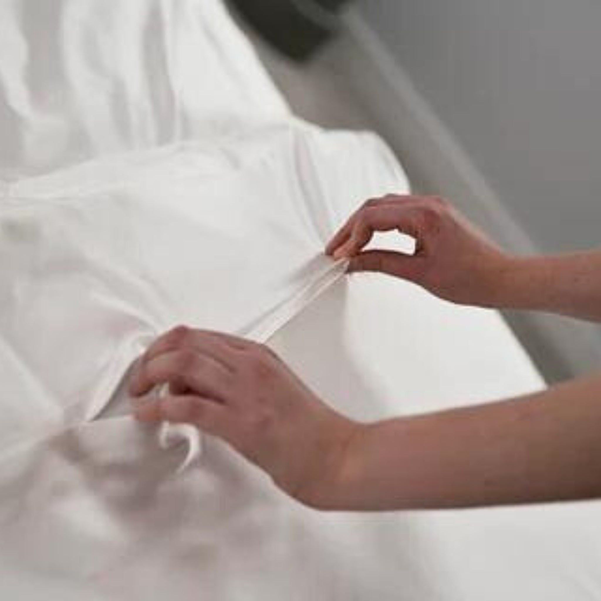 showing concealed zip of an ivory 25 momme silk duvet cover