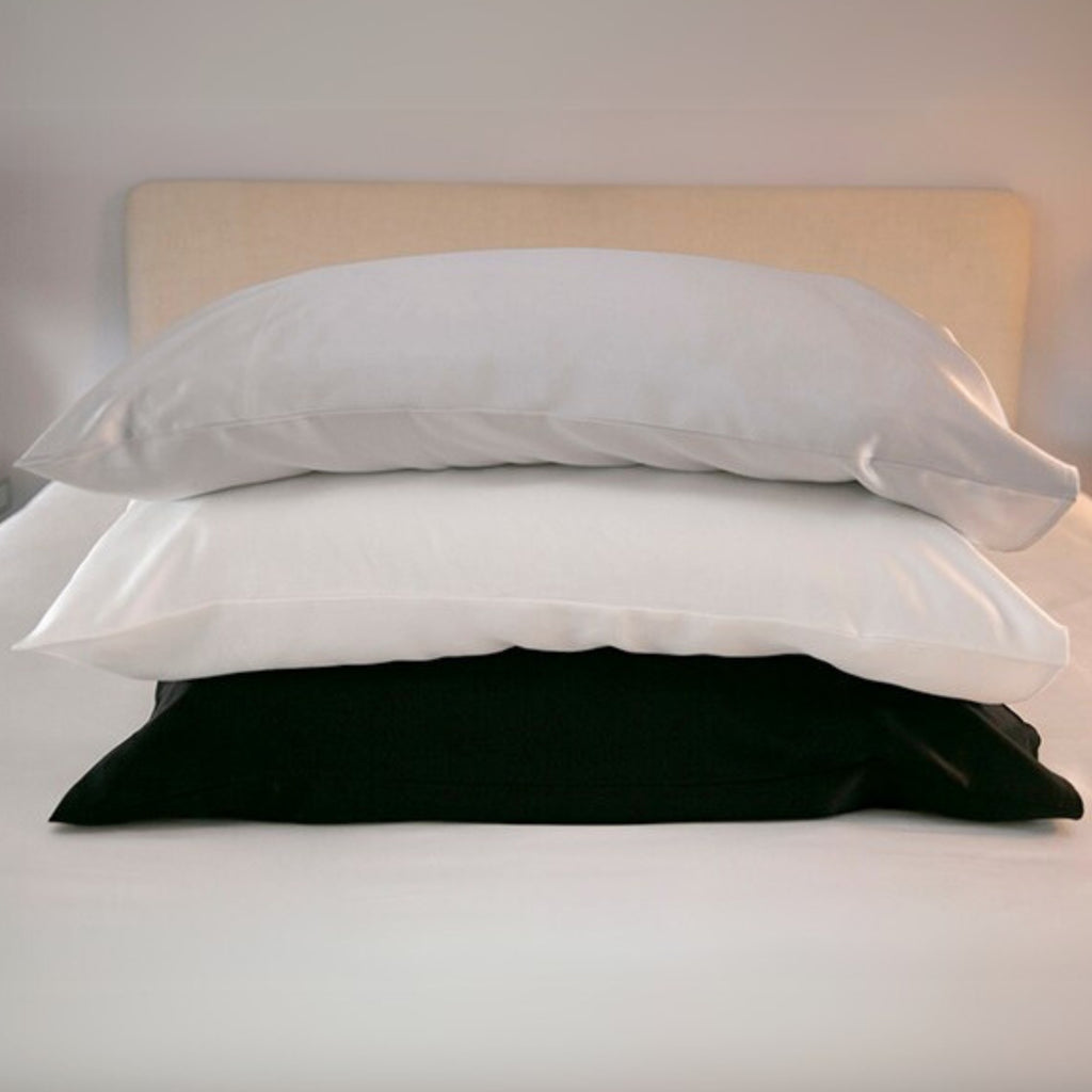 silver, ivory and black 25 momme silk pillowcases stacked