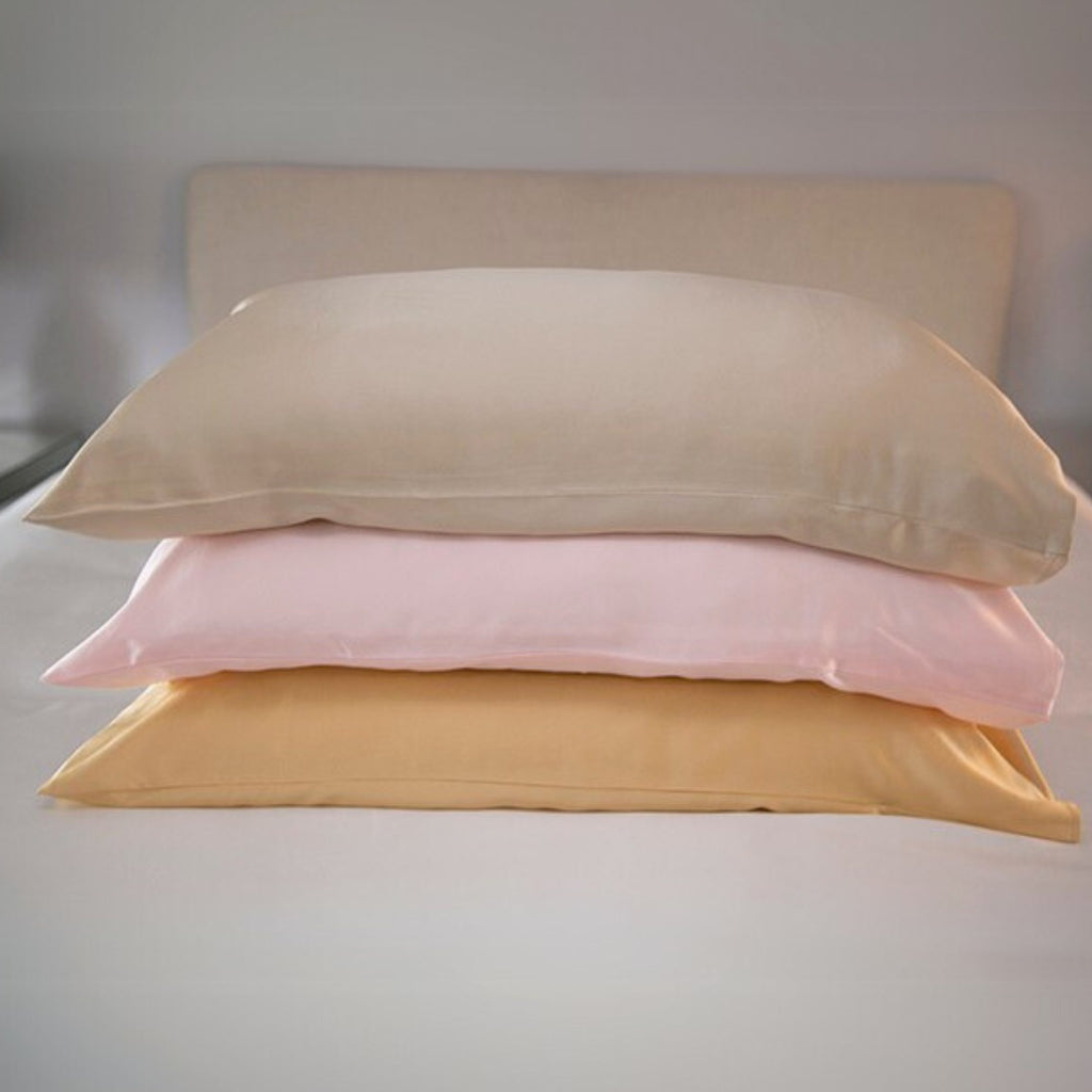 champagne, pink and gold 25 momme silk pillowcases stacked