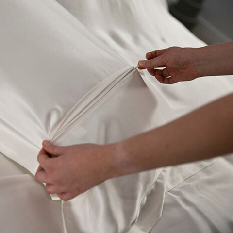 concealed zip on the back of an ivory oxford 25 momme silk pillowcase