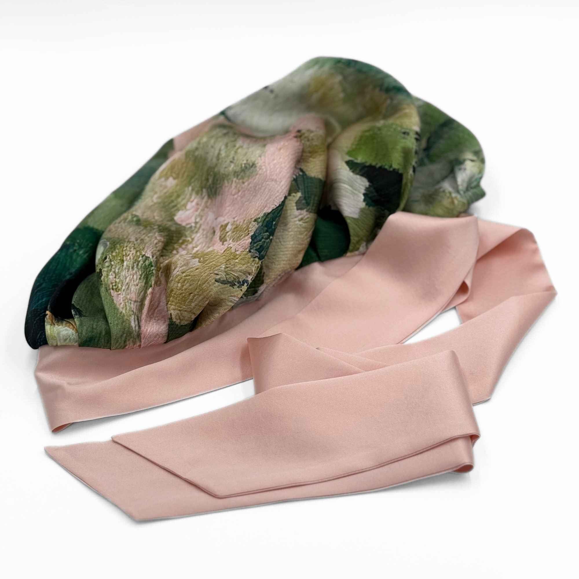 a flat lay picture of the patterned adjustable silk bonnet