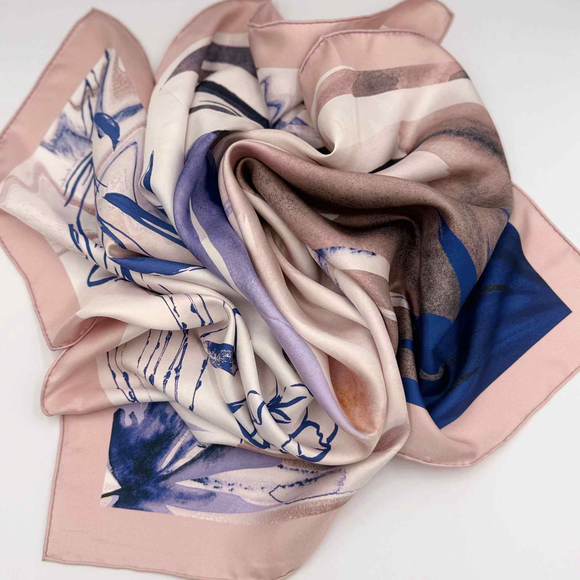 Colorful silk twill scarf with a floral design on a white background