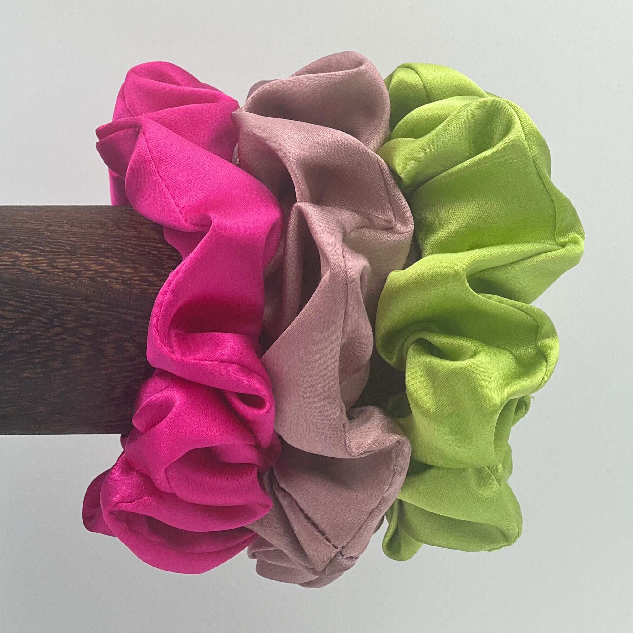 bright pink, dusty pink and lime green silk scrunchies