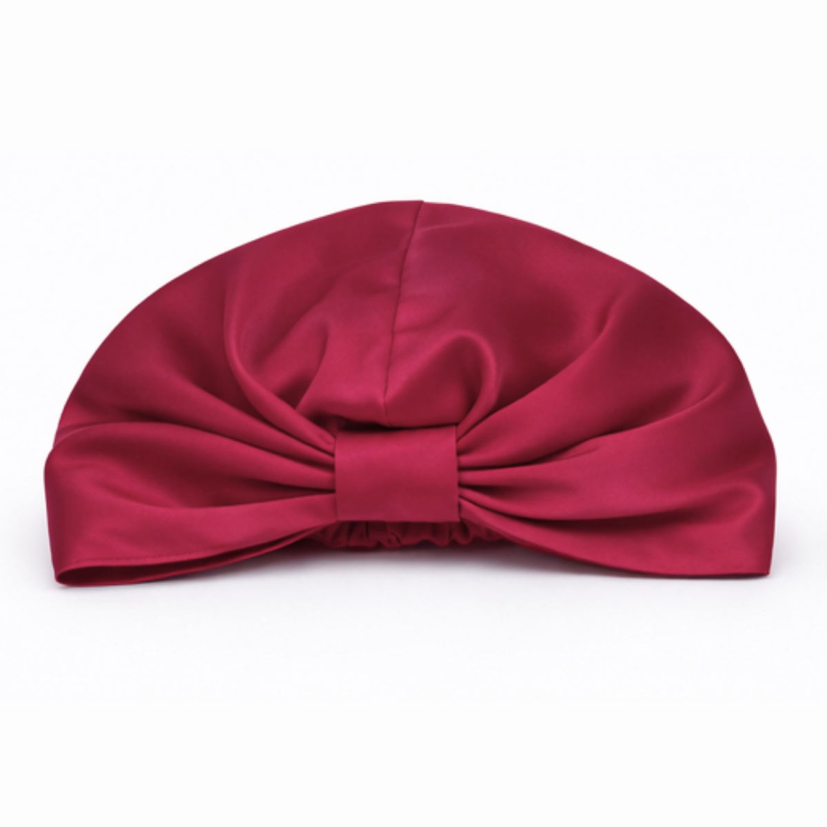red silk bonnet on a white background