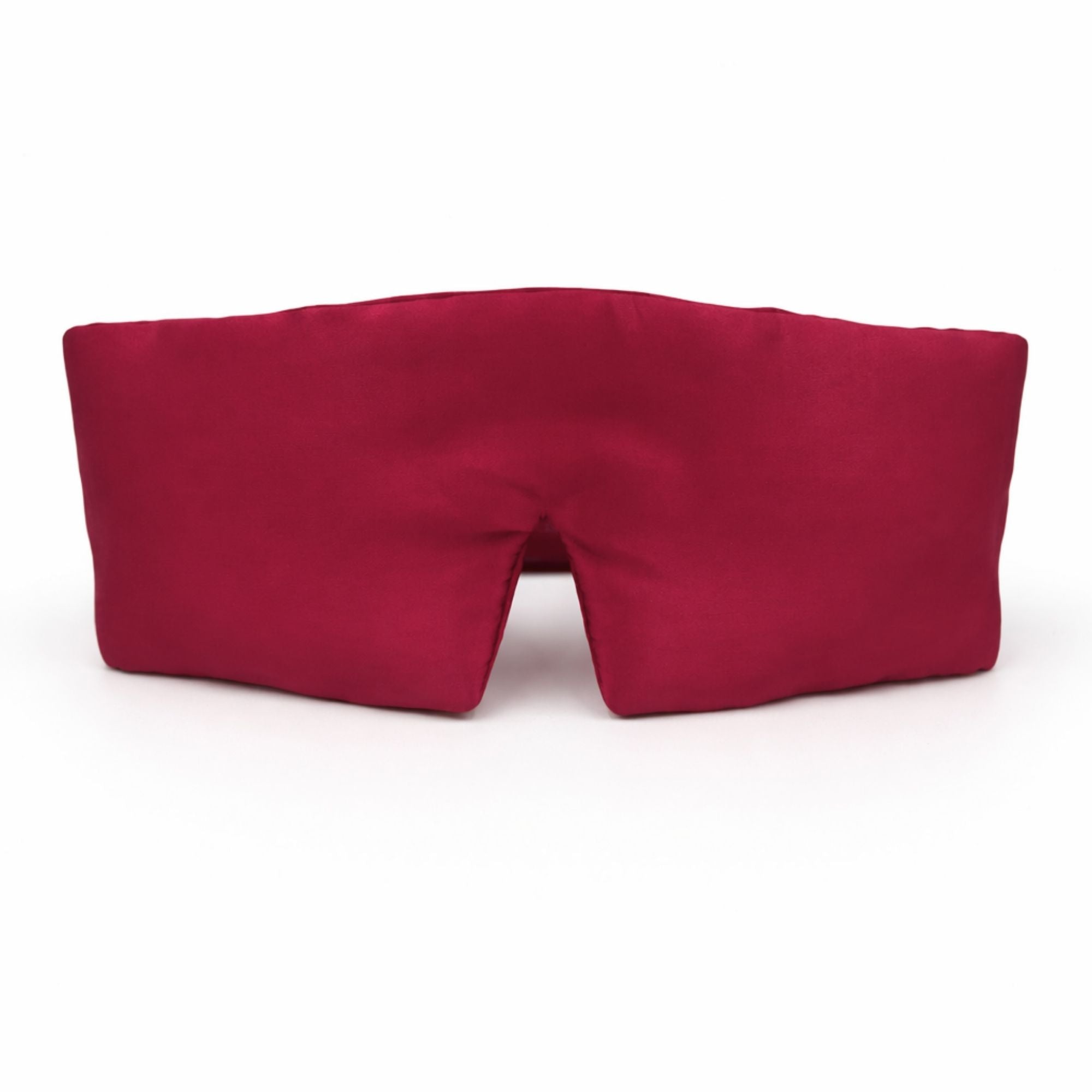 Red silk eye mask on a white background