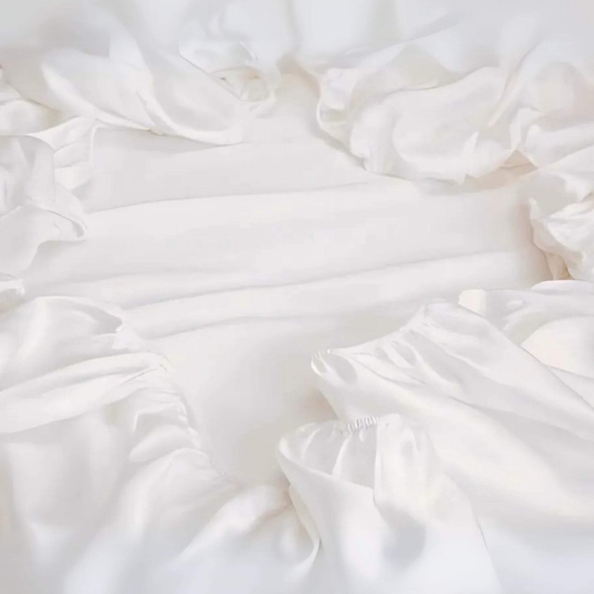 fitted silk sheet not on a bed but showing it's elastication