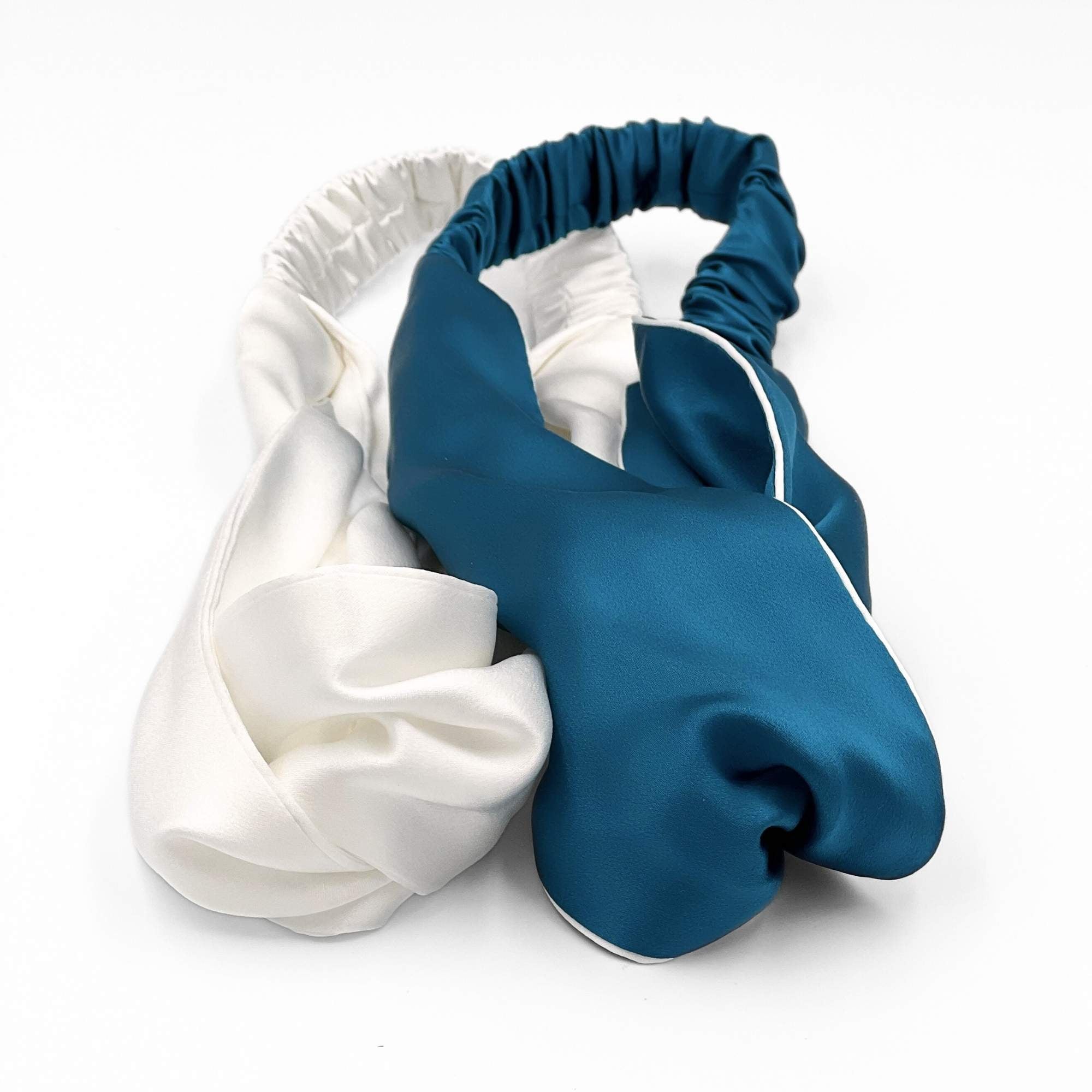 White and blue silk headbands on a white background