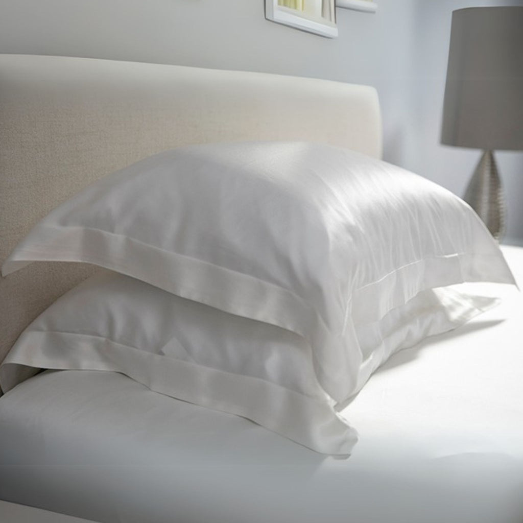 two ivory oxford 25 momme silk pillowcase stacked