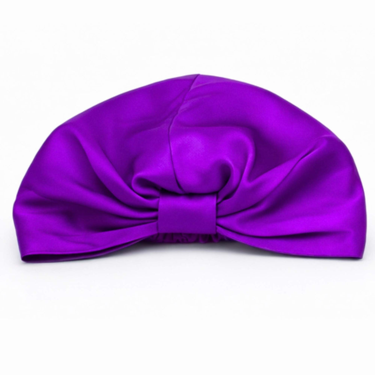 Purple silk bonnet on a white background